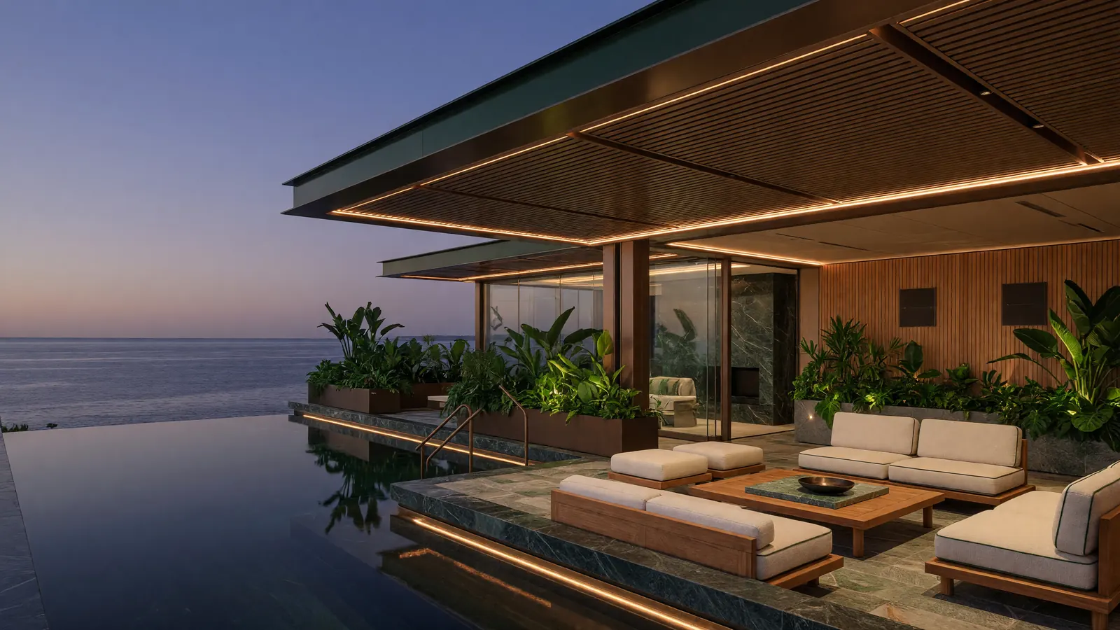 A lit pool and loggia at dusk