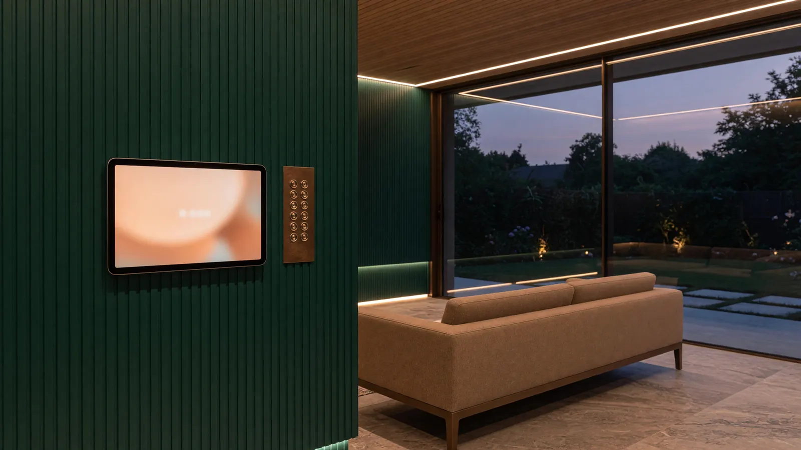 A slim control tablet set into a wall